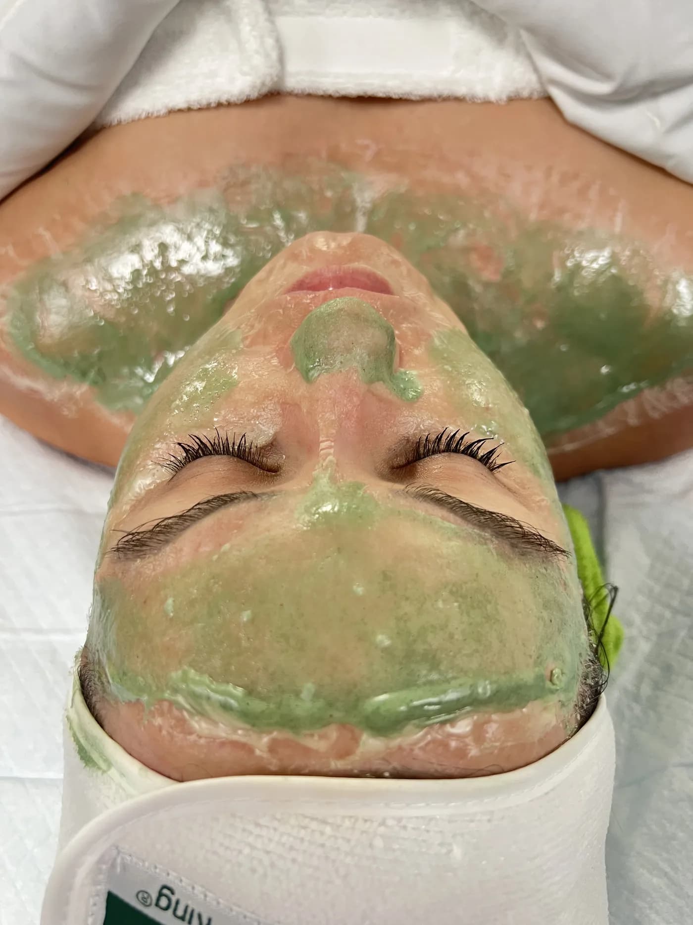 DMK enzyme treatment mask during a facial in Valencia city center at SkyBeauty Valencia